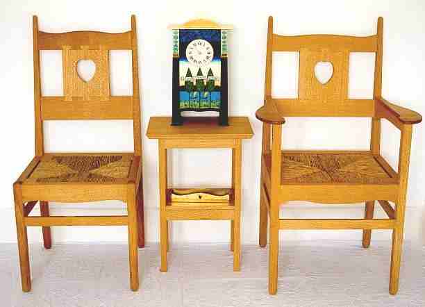 CFA Voysey oak Arts & Crafts chairs, side table & painted clock