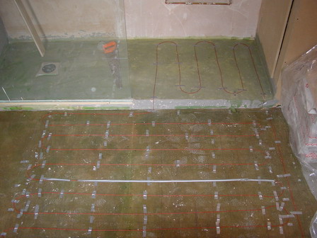 bathroom underfloor heating cables laid ready for tiling