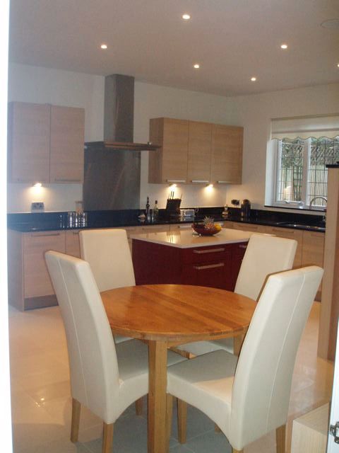 Oak & red gloss lacquer designer fitted kitchen units & island