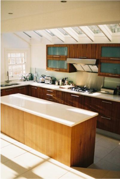 walnut designer fitted kitchen units & island in side return