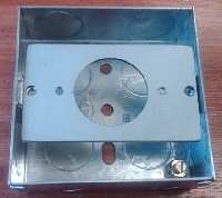Adapter plate to convert a standard metal wall box to take the hardwood pattress box