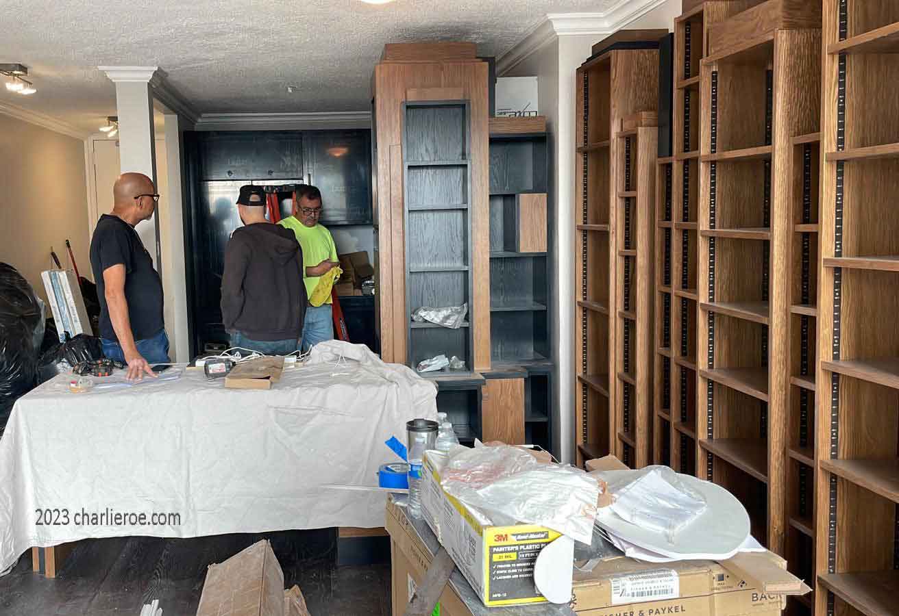 The new Paul Frankl Art Deco Skyscraper style wooden & painted lacquered bookcase desk/table being installed in the appartment