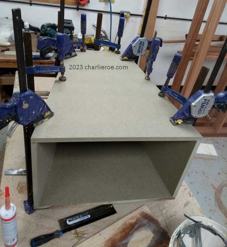 new ancient Egyptian Revival style Pylon shaped painted vanity unit cabinet being constructed