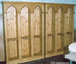 new pair of Reformed Gothic Revival style wood triple bay bookcase