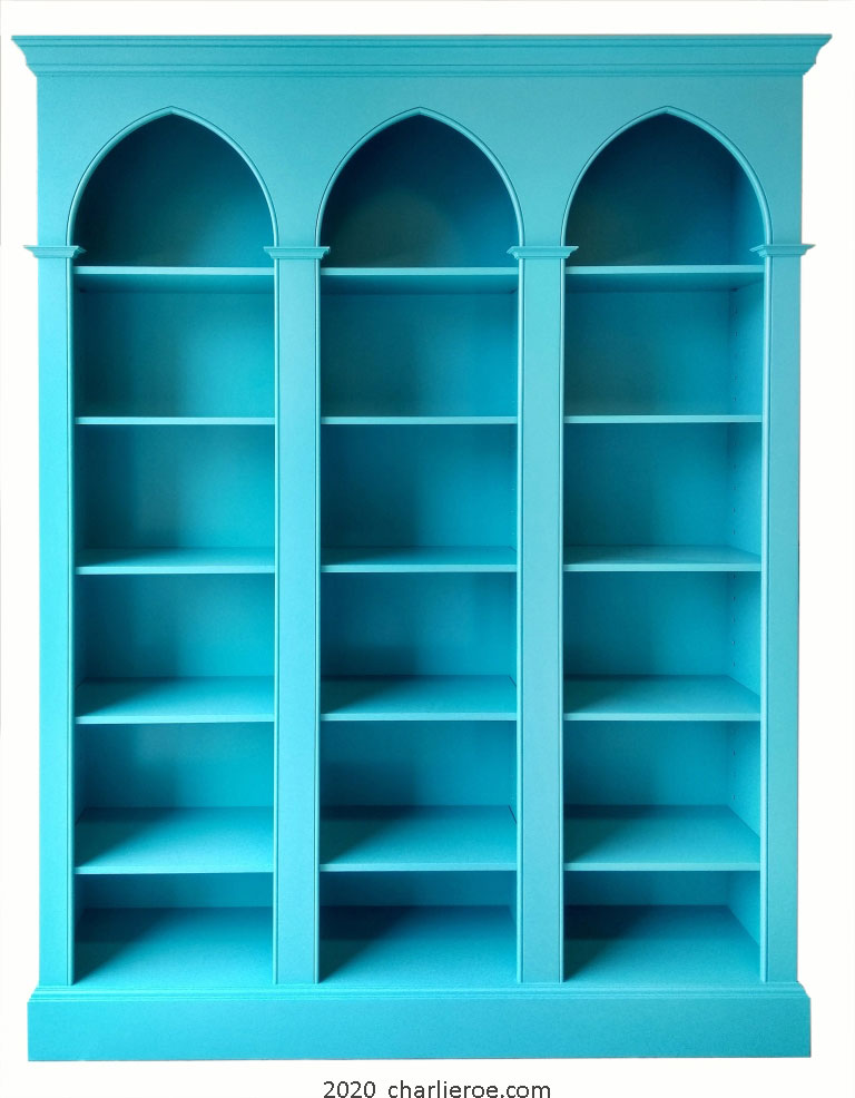 new Reformed Gothic Revival style blue painted triple bay dull red bookcase